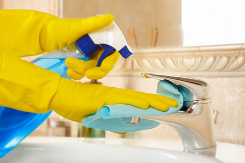 Carpet cleaning process in a Surrey home with careful stain treatment