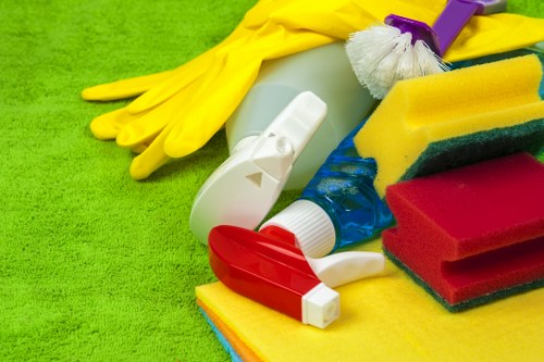 Local cleaner using equipment for hard-to-reach windows in Surrey